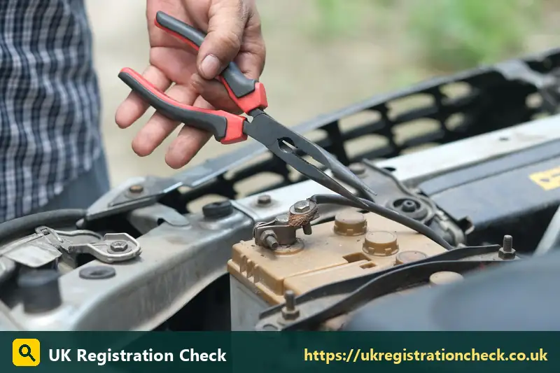 Pliers on a car battery terminal - mot test checklist